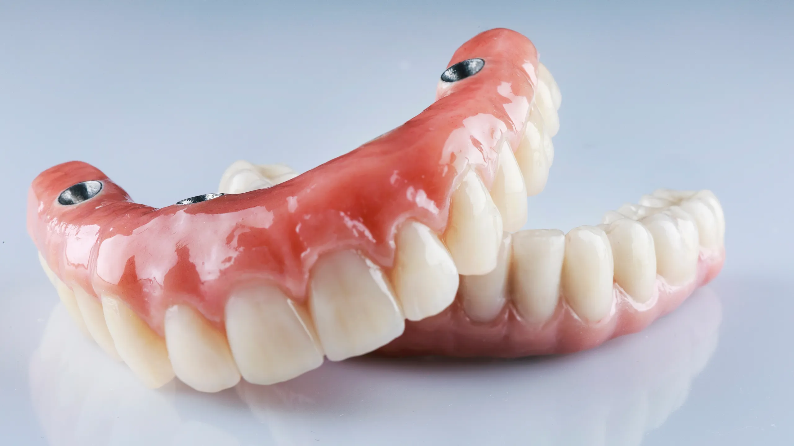 full arch implant treatment and denture stabilization recovery after dental implant surgery